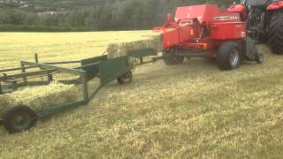 Small baling with Massey Ferguson 1840 baler [upl. by Tasia871]