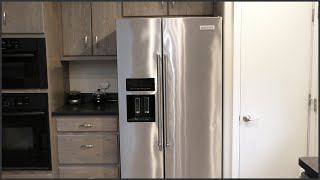 Replacing A KitchenAid Refrigerator Water Filter [upl. by Docile]