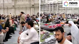 Cramped conditions for Afghan evacuees at US airbase in Qatar [upl. by Crane]