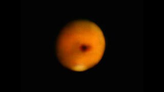 What is this dark object passing in front of Mars [upl. by Susy531]