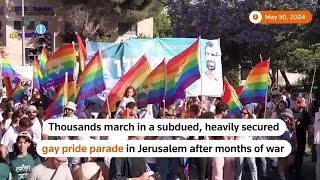 Amid war Jerusalem gay pride parade a subdued affair  REUTERS [upl. by Weylin]