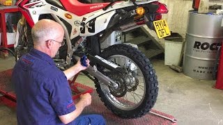 How to replace a motorbike tyre  Honda CRF 250L [upl. by Charmane209]