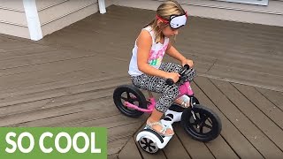 Clever girl uses hoverboard to power pedalless bike [upl. by Htiekal]