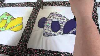 Basic free motion long arm quilting around a purple sunbonnet Sue [upl. by Ilanos498]