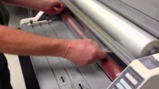 Loading film on GBC Laminator [upl. by Darach]