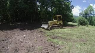 cat d4 dozer pushing rocks [upl. by Tufts]