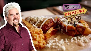 Guy Fieri Eats Pork Tamales  Diners DriveIns and Dives  Food Network [upl. by Ardnekahs]