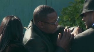 Whitney Houston Funeral  Bobby Brown comforts friend at funeral [upl. by Nylg]