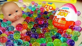 Baby doll and Kinder Joy Surprise egg toys play Orbeez [upl. by Hayse]