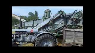 Threshing oats with Advance Rumely Ideal threshing machine July 2012 [upl. by Jephum]