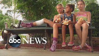 9yearold bitten by shark in kneedeep water l ABC News [upl. by Arocahs684]