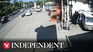 Drivers have lucky escape after motorbikes catch fire at petrol station [upl. by Varipapa]