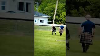 Woman throws in Caber Toss at Highland Games [upl. by Introc594]