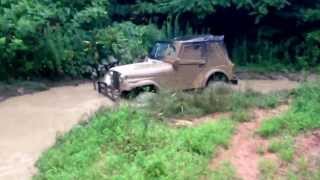 Jeep CJ5 on 38 Swampers Mudding [upl. by Eelnyl]