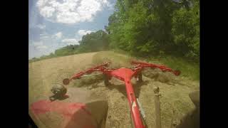 MF 4710 and Kuhn SR110 GII raking hay [upl. by Kenwood]