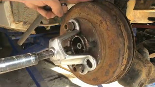 How To Remove Brake Drum On 2006 Ford Focus [upl. by Ayekahs]