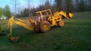 Backhoe going down steep hill [upl. by Uis]