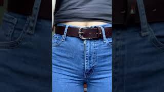 Buttoning and unbuttoning a tight blue jeans with black belt [upl. by Alhsa]