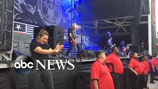 Sign language interpreter rocks out at heavy metal concert [upl. by Sokul941]