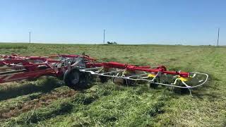 Kubota amp Pottinger Tedding Hay [upl. by Atiker933]