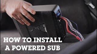 How to install a powered sub in your car  Crutchfield [upl. by Ellesig]