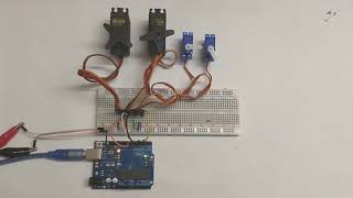 Controlling Multiple Servo Motors with Arduino [upl. by Suolkcin]