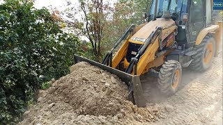 Dust Covered Backhoe LoaderClearing and Widening Dusty Road [upl. by Ynnel399]