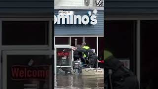 Couple Rescued From Flooding at Dominos PIzza  AccuWeather [upl. by Alta]