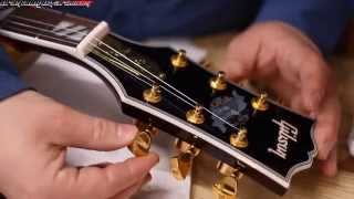 A Guitar Builder Looks at a Chinese made FAKE Gibson Supreme Chibson Guitar [upl. by Ion]