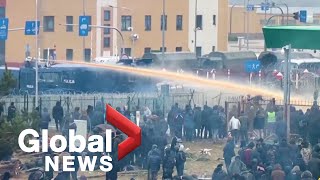 Poland turns water cannons on thousands of migrants as tensions rise at Belarus border [upl. by Solis]