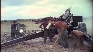 Soldiers fire the 155mm Howitzer for testing and examine it during the Vietnam WaHD Stock Footage [upl. by Rosabella]