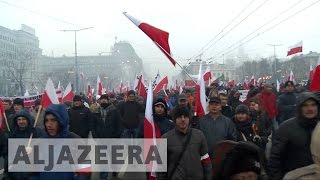 Poland Antiimmigration protests sweep through Warsaw [upl. by Norvin]