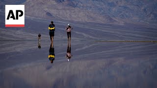 Rains replenish lake in Death Valley one of the driest spots on Earth [upl. by Hamon]