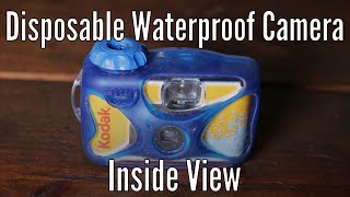 Inside view of a Disposable Waterproof Camera whats inside the case [upl. by Aehtna246]