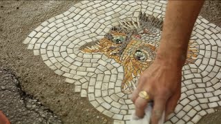 Artists mosaics fill potholes with actual street art [upl. by Atneuqal211]