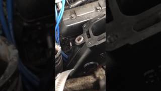 Installing mercruiser exhaust manifold [upl. by Haorbed]