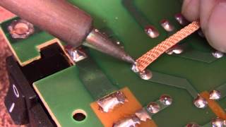 Solder removal from a circuit board [upl. by Nahgeem337]