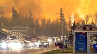 Owners Watched Fort McMurray Home Burn to Ground Over iPhone [upl. by Arek425]