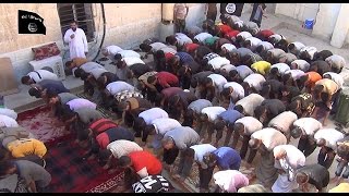 Islamic State video shows conversion of Yazidi men to Islam [upl. by Nipahc427]