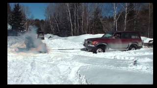 SNOBUNJE PULLS TRUCK AND TRAILER OUT OF THE SNOW [upl. by Odnalref974]