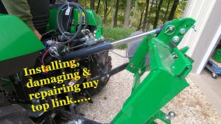 John Deere 2038r Rear Top Link Installation  120 [upl. by Wilscam881]