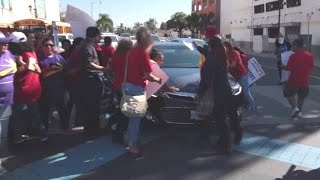 Man drives through protesters blocking road in Southern California [upl. by Yrogiarc]