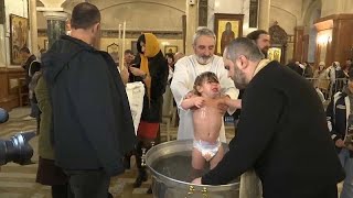 Watch 500 babies baptised in Georgian mass ceremony [upl. by Nehtanhoj883]