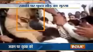 Policeman Beaten up by Passengers for Pushing Man Out of the Train in Haryana [upl. by Buskirk827]