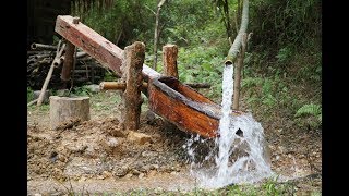 Primitive Skills Water powered hammer Monjolo Part1 [upl. by Jez27]