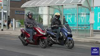 2021 Honda PCX 125 v Yamaha NMAX 125 Scooter comparison test [upl. by Zischke]