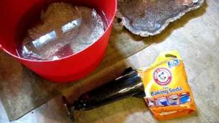 Cleaning silver with baking soda and aluminum foil and hot water [upl. by Ho]