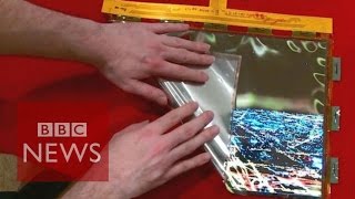 CES 2016 LGs bendy rollup OLED screen  BBC News [upl. by Ashlen137]