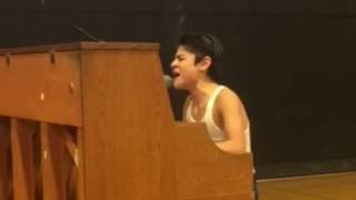 Kid performs Bohemian Rhapsody in front of whole school [upl. by Nnyl84]