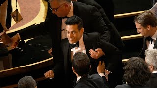 Rami Malek Falls Off 2019 Oscars Stage But Hes Still Celebrating [upl. by Onil604]